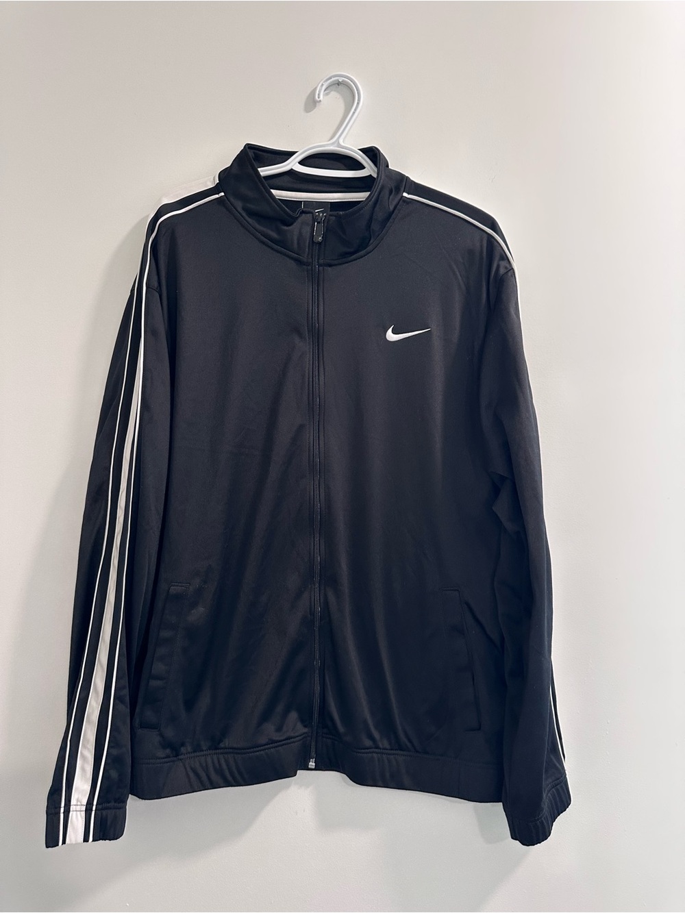 Nike Black Track Jacket with White Stripe Accents